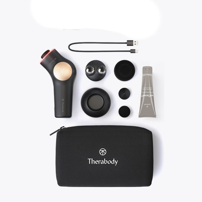 Therabody massage gun set with accessories on a white background