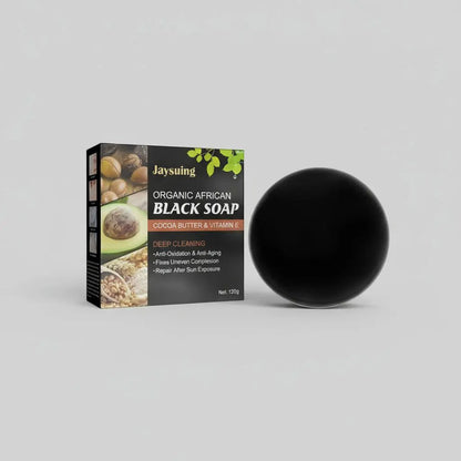 Jaysuing Organic African Black Soap packaging with a close-up of soap on skin and text about its benefits.