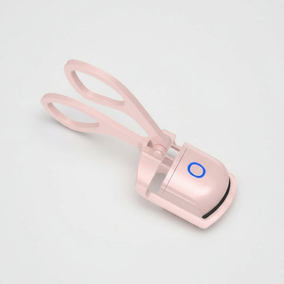 Pink hair removal device with a blue light indicator on a white background, labeled '2pcs'.